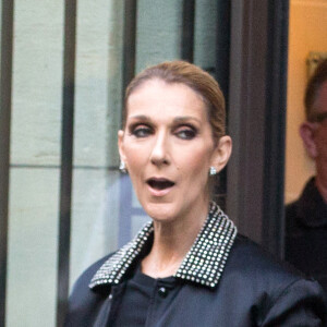 Céline Dion et son fils René-Charles Angelil sortent de l'hôtel Royal Monceau à Paris le 7 juillet 2017. 