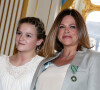 Charlotte Valandrey et sa fille Tara Paris le 10 avril 2013 Remise de la medaille de Chevalier de l'Ordre des Arts et des Lettres par la Ministre de la Culture et de la Communication, au Ministere de la Culture.