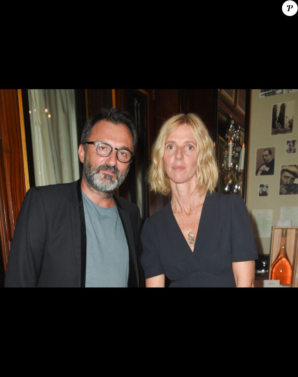 Frédéric Lopez et Sandrine Kiberlain - Vente aux enchères "Les Vendanges Solidaires Barriére" au Fouquet's, Hôtel Barrière à Paris le 18 juin 2018. © Coadic Guirec/Bestimage.