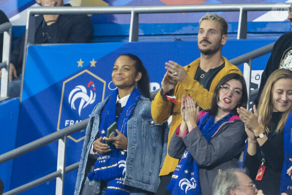 M. Pokora (Matt Pokora), sa femme Christina Milian assistent au match de la 5e et avant-dernière journée de Ligue des nations entre la France et l'Autriche (2-0) au Stade de France à Saint-Denis le 22 septembre 2022.