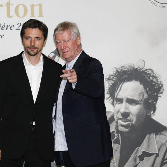 Raphaël Personnaz et Régis Wargnier - Photocall de la cérémonie de clôture de la 14ème Edition du festival du cinéma Lumière Film Festival à Lyon. Le 21 octobre 2022 © Pascal Fayolle / Bestimage.