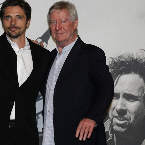 Raphaël Personnaz et Régis Wargnier - Photocall de la cérémonie de clôture de la 14ème Edition du festival du cinéma Lumière Film Festival à Lyon. Le 21 octobre 2022. © Pascal Fayolle / Bestimage.