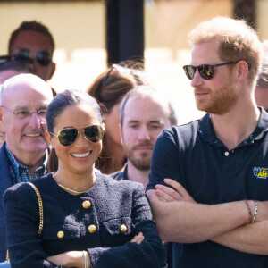 Le prince Harry et Meghan Markle lors du "Land Rover Challenge" au premier jour des Invictus Games 2020 à La Haye, le 16 avril 2022. 