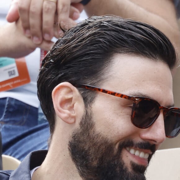 Théma - Les amoureux de Roland Garros - Sofia Essaïdi et son compagnon Adrien Galo - People dans les tribunes lors des Internationaux de France de Tennis de Roland Garros 2022 à Paris le 29 mai 2022. © Cyril Moreau/Bestimage