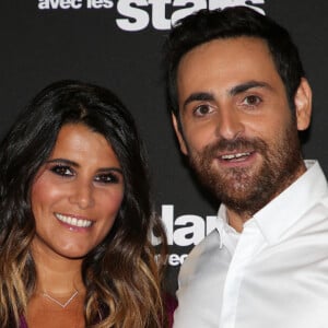 Karine Ferri et Camille Combal - Photocall de la saison 9 de l'émission "Danse avec les stars" (DALS) au siège de TF1 à Boulogne-Billancourt le 11 septembre 2018. © Denis Guignebourg/Bestimage 