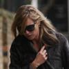 Le lendemain de la mort de son ami le designer Alexander McQueen, Kate Moss semble dévastée dans les rues du quartier St John's Wood à Londres le 12 février 2010