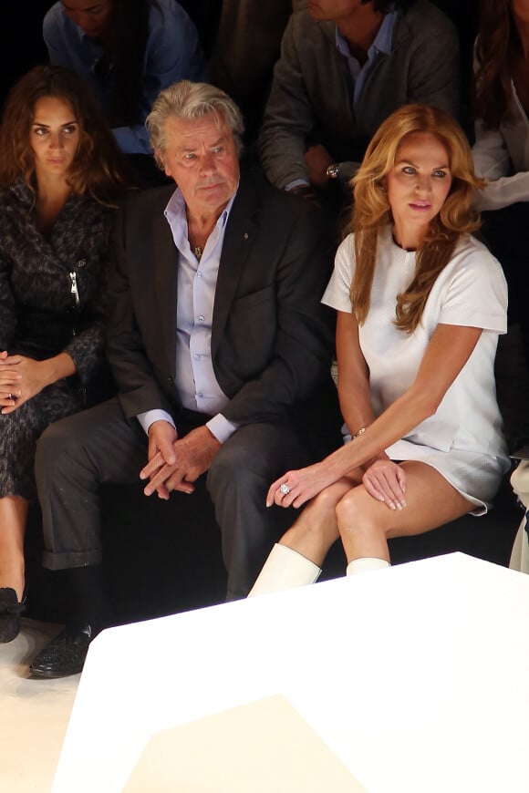 Alain Delon et Rosalie Van Breemen au défilé de mode Elie Saab - Collection pret-a-porter printemps-ete 2013 - paris le 3 octobre 2012