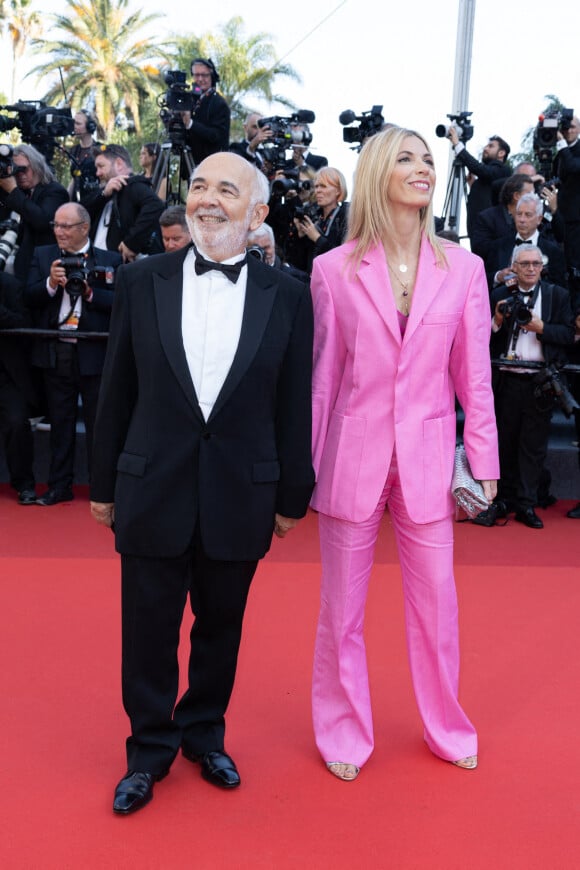 Gérard Jugnot et sa femme Patricia Campi - Montée des marches du film "Coupez !" pour la cérémonie d'ouverture du 75ème Festival International du Film de Cannes. © Olivier Borde / Bestimage. 