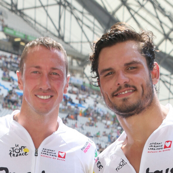 Exclusif - Frédérick Bousquet, Florent Manaudou - Arrivée de l'étape du coeur 2017 au profit de l'association "Mécénat Chirurgie Cardiaque" - Stade Orange Vélodrome - Marseille le 22 juillet 2017. © CVS/Bestimage