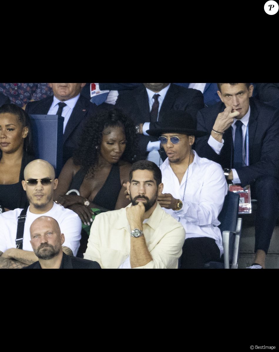 Aya Nakamura, Nikola Karabatic au match aller de la Ligue des Champions entre le Paris Saint-Germain et la Juventus (2-1) au Parc des Princes à Paris le 6 septembre 2022.