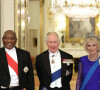 Cyril Ramaphosa, président de l'Afrique du Sud, Le roi Charles III d'Angleterre et Camilla Parker Bowles, reine consort d'Angleterre - Arrivées au Banquet d'Etat organisé au palais de Buckingham, à Londres, pendant la visite d'Etat du président sud-africain au Royaume-Uni le 22 novembre 2022. 