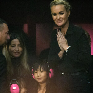 Exclusif - Laeticia Hallyday et ses filles Jade et Joy - Aftershow apres le concert caritatif de Johnny Hallyday pour l'association de sa femme "La Bonne Etoile", qui vient en aide aux enfants du Vietnam, au Trianon a Paris, le 15 decembre 2013.