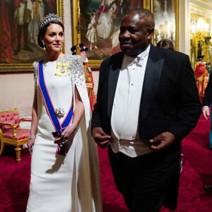 Catherine (Kate) Middleton, princesse de Galles (porte le diadème "Lover's Knot", le préféré de Diana), Cyril Ramaphosa, président de l'Afrique du Sud - Arrivées au Banquet d'Etat organisé au palais de Buckingham, à Londres, pendant la visite d'Etat du président sud-africain au Royaume-Uni le 22 novembre 2022. 