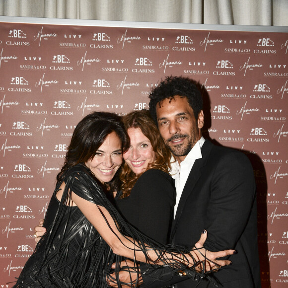 Exclusif - Sandra Sisley (robe Jitrois), Aurélie Saada et Tomer Sisley - Soirée du 49ème anniversaire de Sandra Sisley (né le 25 avril) et les 6 ans de "Retrouvite" avec son mari Tomer au restaurant Mamamia à Paris le 12 mai 2022. © Pierre Perusseau/Bestimage 