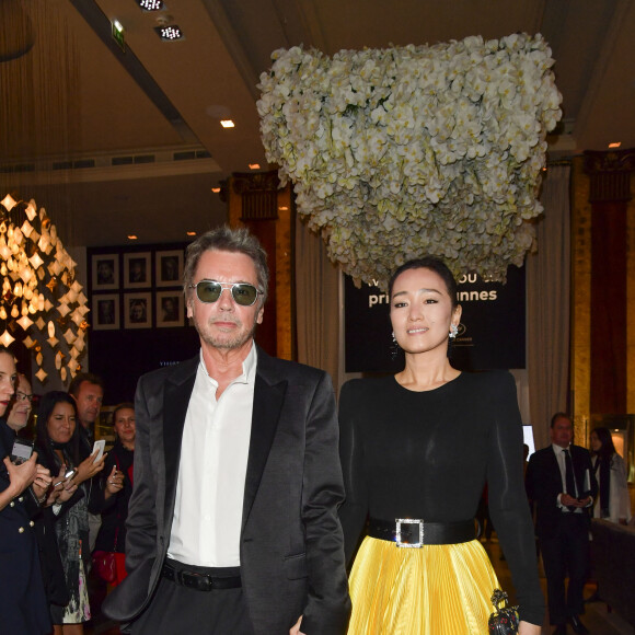 Jean-Michel Jarre et sa compagne Gong Li - People à l'hôtel Majestic lors du 72ème Festival International du Film de Cannes le 19 mai 2019. © Pierre Perusseau/Bestimage  People at the Majestic Hotel during the 72nd Cannes International Film Festival on May 19, 2019.