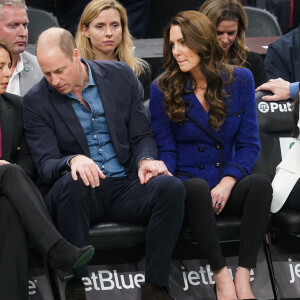 Le prince de Galles William et Kate Catherine Middleton, princesse de Galles, lors du match de basket "Boston Celtics vs Miami Heat" à Boston. Le 30 novembre 2022 