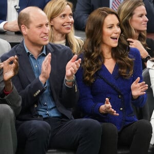 Le prince William, prince de Galles, et Catherine (Kate) Middleton, princesse de Galles, assistent au match de NBA "Boston Celtics - Miami Heat" au TD Garden à Boston, le 30 novembre 2022. 