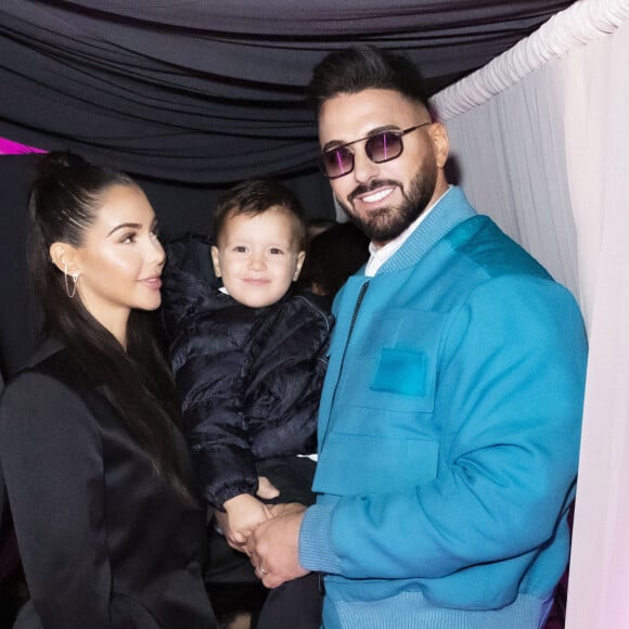 Exclusif - Nabilla Benattia, son mari Thomas Vergara et leur fils Milann posent lors de l'avant-première du documentaire "Nabilla sans filtre" (Amazon Prime Vidéo) à Paris le 22 novembre 2021. © Jack Tribeca / Bestimage 