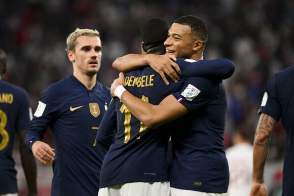 Antoine Griezmann, Ousmane Dembele, Kylian MBappe - Joie des joueurs français lors du match des 1/8emes de finale de la Coupe de Monde de Football "France vs Pologne (3-1)" à Doha au Qatar. Le 4 décembre 2022 © JB Autissier / Panoramic / Bestimage