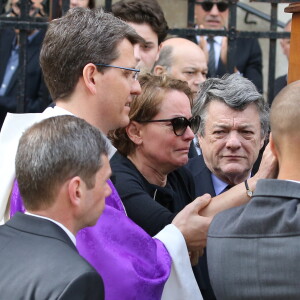 Cendrine Dominguez, Jean-Louis Borloo - Sorties des obsèques de Patrice Dominguez en la basilique Sainte Clotilde à Paris. Le 16 avril 2015