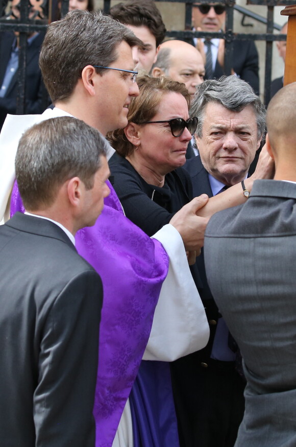 Cendrine Dominguez, Jean-Louis Borloo - Sorties des obsèques de Patrice Dominguez en la basilique Sainte Clotilde à Paris. Le 16 avril 2015