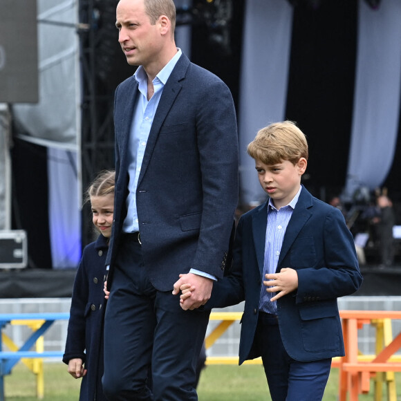 Le prince William, duc de Cambridge, le prince George de Cambridge et la princesse Charlotte de Cambridge en visite au château de Cardiff, Royaume Uni, le 4 juin 2022, à l'occasion du jubilé de platine de la reine d'Angleterre. 