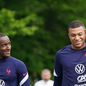 Moussa Diaby, Kylian Mbappe et Adrien Rabiot - Entrainement de l'Equipe de France A au Centre National du Football, à Clairefontaine-en-Yvelines, le 29 mai 2022.