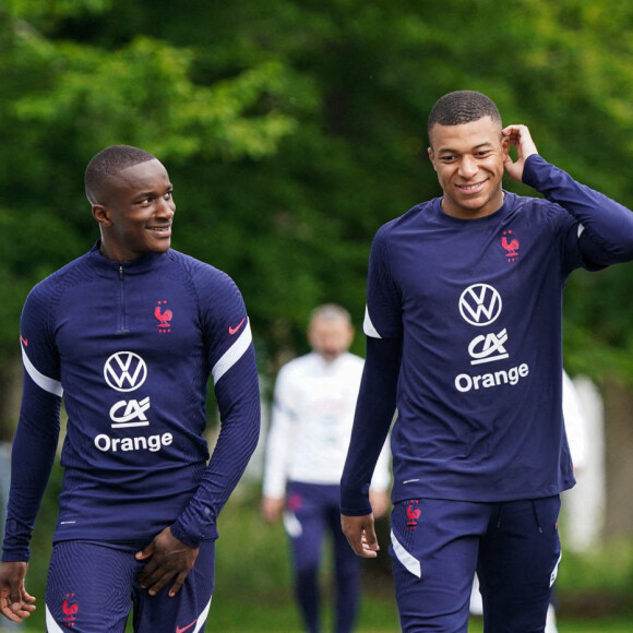 Moussa Diaby, Kylian Mbappe et Adrien Rabiot - Entrainement de l'Equipe de France A au Centre National du Football, à Clairefontaine-en-Yvelines, le 29 mai 2022.