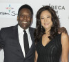 Pelé (Edson Arantes do Nascimento) et sa femme Marcia Aoki assistent à la première du film "Pelé : The birth of a legend" lors du Festival du Film de Tribeca à New York.
