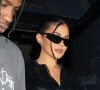 Travis Scott avec sa compagne Kylie Jenner ont dîné au restaurant Craig's à West Hollywood le 10 juillet 2022. 
