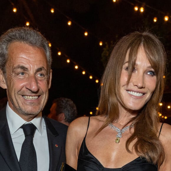 Carla Bruni et son mari Nicolas Sarkozy - Soirée "Women In Motion" par Kering au Château de la Castre lors du 75e Festival de Cannes. © Olivier Borde / Bestimage 