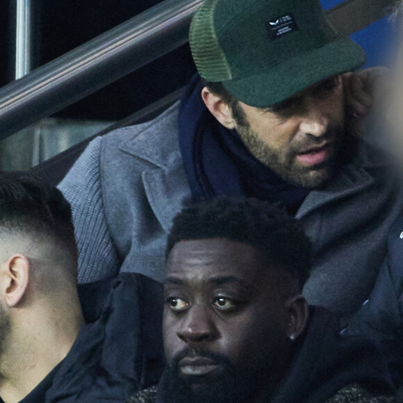 Benjamin Millepied et son fils Aleph - People dans les tribunes du match de Ligue 1 Uber Eats "PSG contre Angers" (2-0) au Parc des Princes à Paris le 11 janvier 2023. © Cyril Moreau/Bestimage