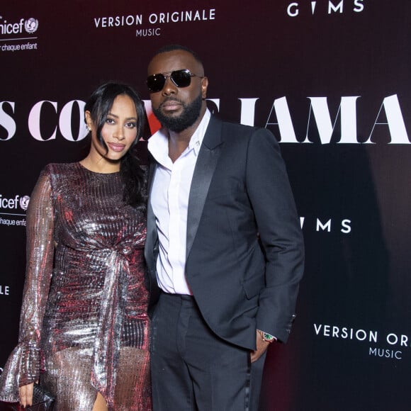 Gims et sa femme DemDem au photocall de la soirée "Unis comme jamais" au profit de l'Unicef, au pavillon Cambon à Paris. Le 8 novembre 2021. © Pierre Perusseau / Bestimage 