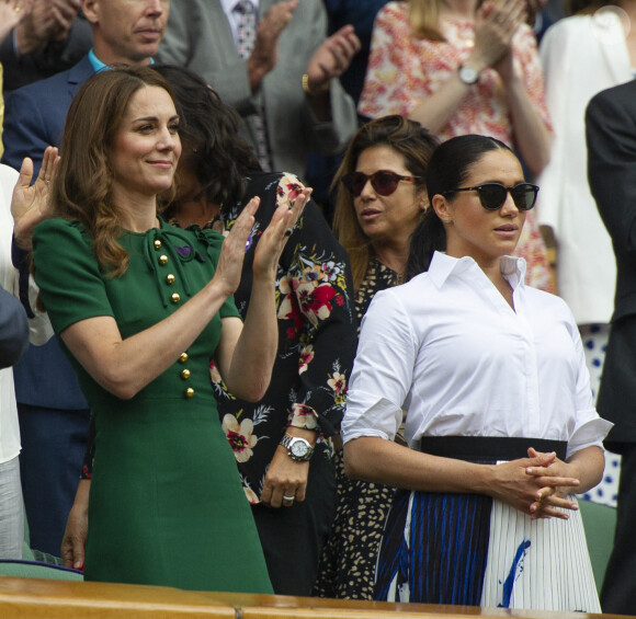 Catherine (Kate) Middleton, duchesse de Cambridge, Meghan Markle, duchesse de Sussex, et Pippa Middleton dans les tribunes lors de la finale femme de Wimbledon "Serena Williams - Simona Halep (2/6 - 2/6) à Londres, le 13 juillet 2019. 