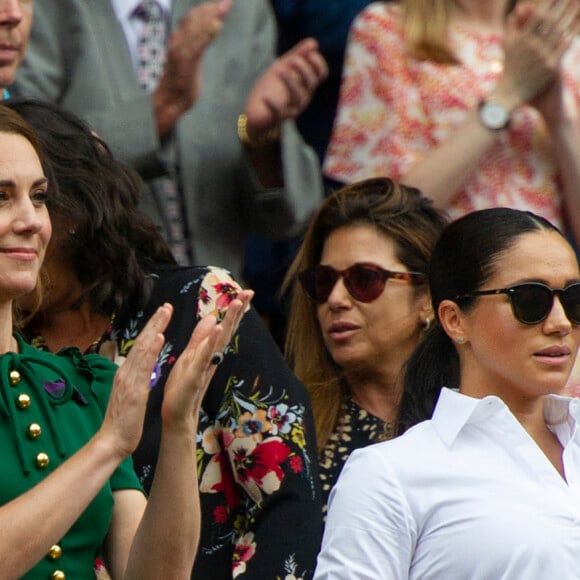 Catherine (Kate) Middleton, duchesse de Cambridge, Meghan Markle, duchesse de Sussex, et Pippa Middleton dans les tribunes lors de la finale femme de Wimbledon "Serena Williams - Simona Halep (2/6 - 2/6) à Londres, le 13 juillet 2019. 