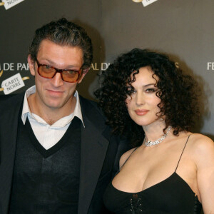 Vincent Cassel et Monica Bellucci lors de l'ouverture du Festival du Film de Paris au cinéma UGC Normandie le 30 mars 2004