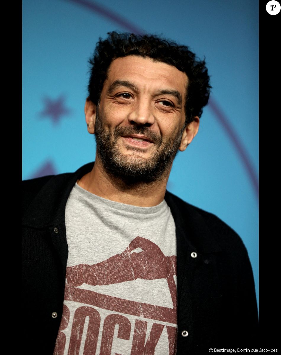Ramzy Bedia - Photocall de la soirée lors de la 25ème édition du Festival international du film de comédie de l'Alpe d'Huez le 18 janvier 2022. © Dominique Jacovides / Bestimage