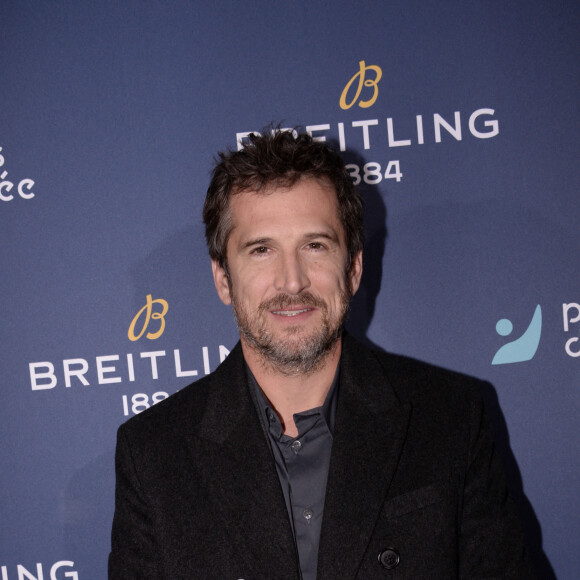 Exclusif - Guillaume Canet - Dîner de charité Breitling pour l'association "Premiers de cordée" à la Samaritaine à Paris le 8 octobre 2021.  © Rachid Bellak / Bestimage 