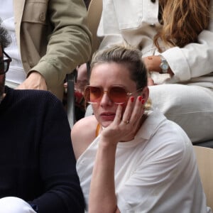 Théma - Les amoureux de Roland Garros - Charlie Bruneau et son compagnon Jean Baptiste Pouilloux en tribunes lors des Internationaux de France de tennis de Roland Garros à Paris, France, le 26 mai 2022. 