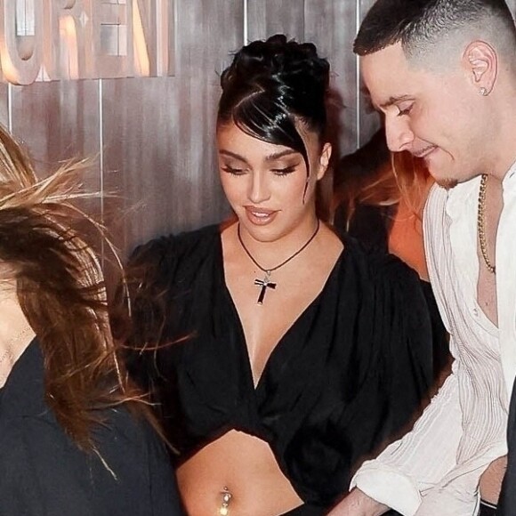 Lourdes Leon - Madonna fait la fête avec sa fille Lourdes Leon lors d'une soirée en son honneur pendant la foire d'art contemporain "Art Basel" à Miami, le 1er décembre 2022.  Pop icon Madonna stuns as she steps out in a risqué black lace ensemble and edgy orange braids for a night of partying on South Beach. The youthful looking 64-year-old trendsetter proves she can party with the best of them as she is seen attending an after party with her daughter Lourdes Leon during Art Basel. The event was set in honor of Madonna. December 1st, 2022. 