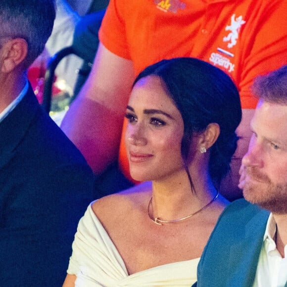 Le prince Harry et Meghan Markle lors de la cérémonie d'ouverture des Invictus Games 2020 à La Haye, le 16 avril 2022. 