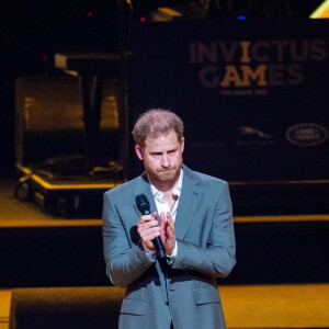 Le prince Harry et Meghan Markle lors de la cérémonie d'ouverture des Invictus Games 2020 à La Haye, le 16 avril 2022. 