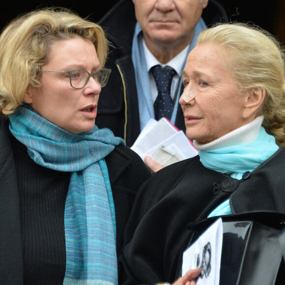 Exclusif - Brigitte Fossey, sa fille Marie Adam et son mari Yves Samama aux obsèques de Marcelle Feuillade ( mère de Brigitte Fossey) en l'Eglise de Notre Dame de Boulogne Billancourt le 23 décembre 2016.