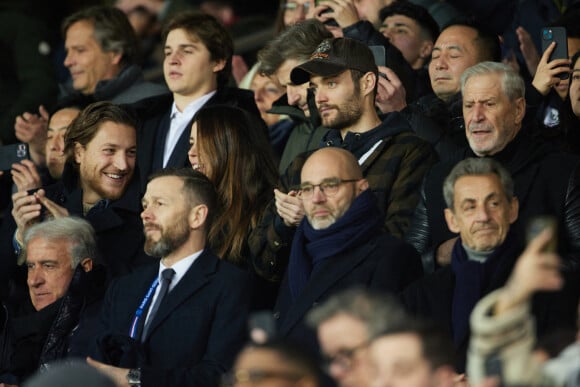 Exclusif - Jean Sarkozy, Louis Sarkozy et sa femme Natali Husic, Jean-Claude Darmon, Nicolas Sarkozy - People en tribunes du match de Ligue 1 Uber Eats "PSG contre Reims" (1-1) au Parc des Princes à Paris le 29 janvier 2023. 