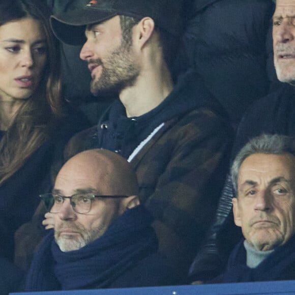 Exclusif  - Jean Sarkozy, Louis Sarkozy et sa femme Natali Husic, Jean-Claude Darmon, Nicolas Sarkozy - People en tribunes du match de Ligue 1 Uber Eats "PSG contre Reims" (1-1) au Parc des Princes à Paris le 29 janvier 2023. 