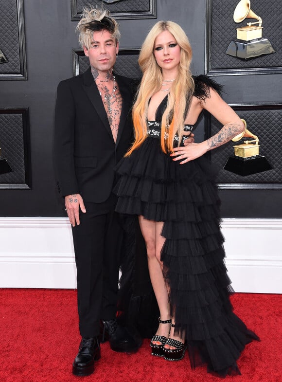 Avril Lavigne et Mod Sun au photocall de la 64ème édition des Grammy Awards au MGM Grand Garden à Las Vegas le 3 avril 2022.