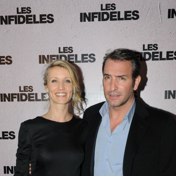 Alexandra Lamy et Jean Dujardin lors de l'avant-première des Infidèles à Paris le 14 février 2012
