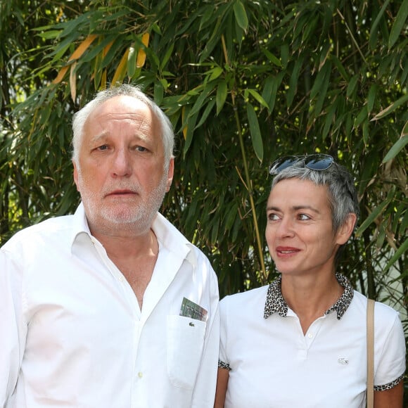 François Berléand et sa compagne, Alexia Stresi - People au village des Internationaux de France de tennis de Roland Garros à Paris, le 31 mai 2014.