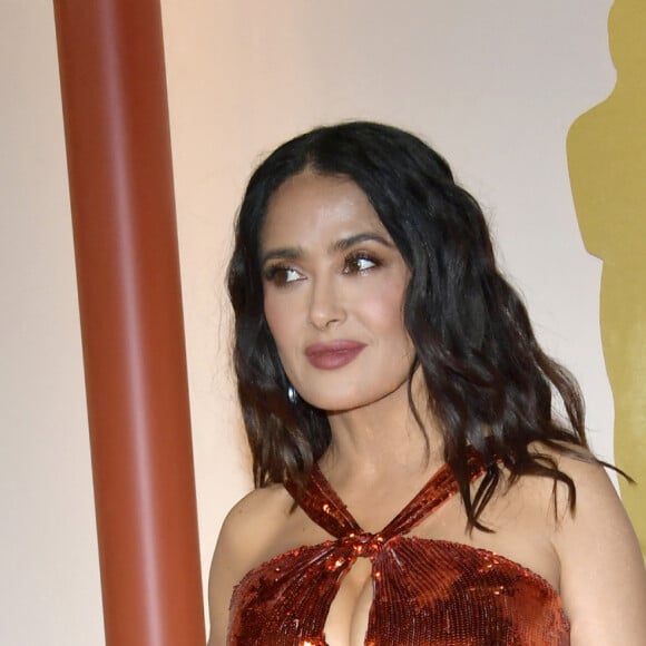 Salma Hayek au photocall de la 95ème édition de la cérémonie des Oscars à Los Angeles, le 12 mars 2023. 