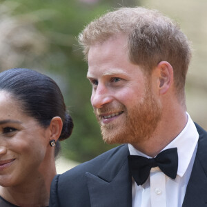 Le prince Harry, duc de Sussex, et Meghan Markle, duchesse de Sussex, à la première du film "Le Roi Lion" au cinéma Odeon Luxe Leicester Square à Londres, le 14 juillet 2019. 